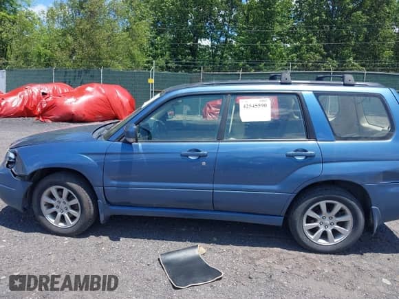 2008 Subaru Forester X with VIN JF1SG65678H731063, listed as a IAAI auction lot 42545590 with 194,526 mi miles and . Bid and sale history available at DreamBid. Image 14.