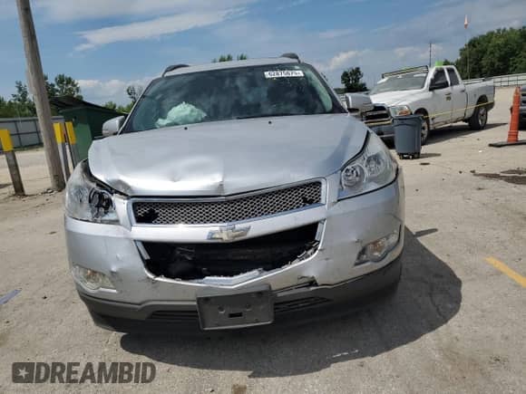 2012 Chevrolet Traverse LTZ с VIN 1GNKRLED7CJ337539, выставлен на аукционе Copart как лот 62875875 с пробегом Не указан миль и Списание • Salvage title. История ставок и продаж доступна на DreamBid. Изображение 5.
