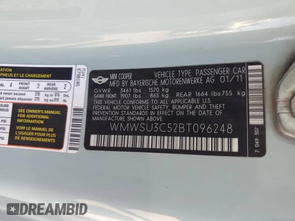 2011 MINI Hardtop with VIN WMWSU3C52BT096248, listed as a Copart auction lot 62008285 with 129,794 mi miles and Salvage title. Bid and sale history available at DreamBid. Image 13.