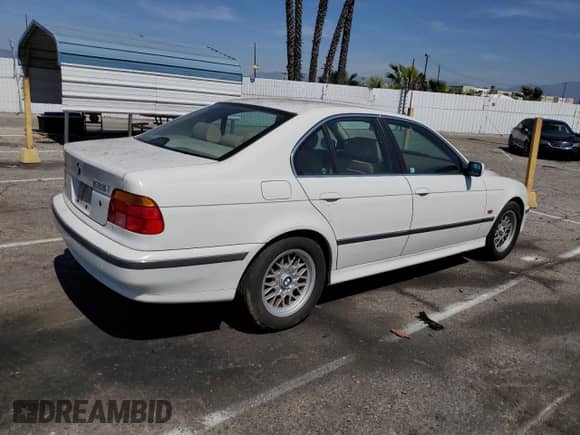 1999 BMW 5 Series 528i с VIN WBADM6332XBY30215, выставлен на аукционе Copart как лот 49855695 с пробегом 92 697 миль миль и Чистый • Clean title. История ставок и продаж доступна на DreamBid. Изображение 3.