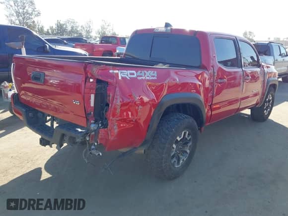 2021 Toyota Tacoma SR z VIN 5TFCZ5AN0MX262902, wystawiony jako IAAI lot #43535009 z przebiegiem 70 926 mil mil oraz . Historia ofert i sprzedaży dostępna na DreamBid. Obrazek 4.