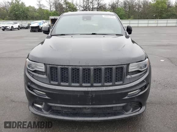 2016 Jeep Grand Cherokee SRT z VIN 1C4RJFDJXGC343157, wystawiony jako Copart lot #59521275 z przebiegiem Nie podano mil oraz Szkoda całkowita • Salvage title. Historia ofert i sprzedaży dostępna na DreamBid. Obrazek 5.