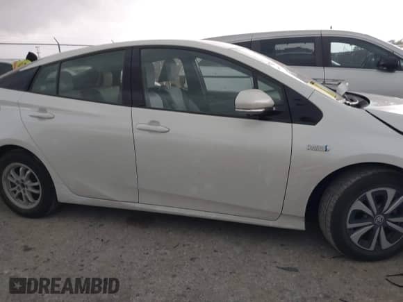2018 Toyota Prius Plus z VIN JTDKARFP0J3084142, wystawiony jako IAAI lot #41936736 z przebiegiem 50 699 mil mil oraz . Historia ofert i sprzedaży dostępna na DreamBid. Obrazek 13.