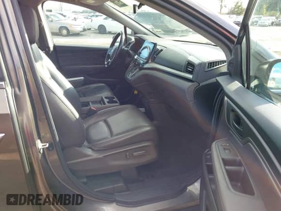 2019 Honda Odyssey EX-L with VIN 5FNRL6H72KB134015, listed as a IAAI auction lot 43556891 with 88,201 mi miles and . Bid and sale history available at DreamBid. Image 5.