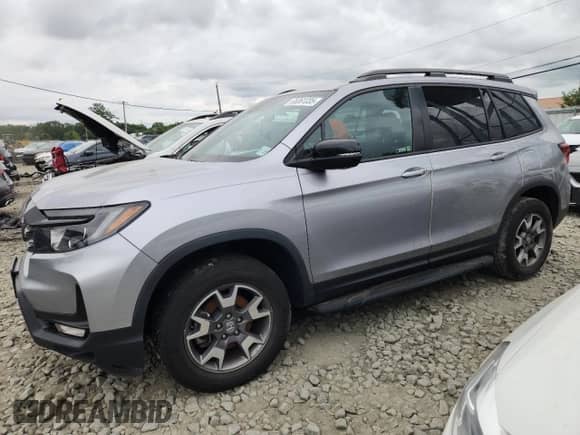 2022 Honda Passport TrailSport z VIN 5FNYF8H65NB017409, wystawiony jako Copart lot #65361335 z przebiegiem Nie podano mil oraz Szkoda całkowita • Salvage title. Historia ofert i sprzedaży dostępna na DreamBid. Obrazek 1.