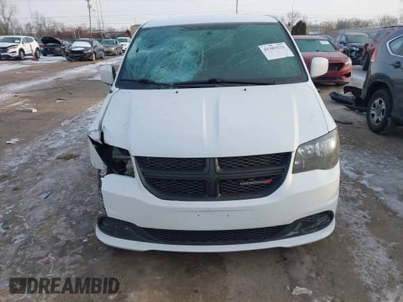 2016 Dodge Grand Caravan SE Plus with VIN 2C4RDGBGXGR170252, listed as a IAAI auction lot 41385171 with 205,424 mi miles and . Bid and sale history available at DreamBid. Image 12.