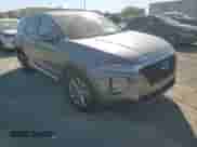 2019 Hyundai Santa Fe SE z VIN 5NMS2CAD3KH095873, wystawiony jako Copart lot #85199995 z przebiegiem 68 309 mil mil oraz Szkoda całkowita • Salvage title. Historia ofert i sprzedaży dostępna na DreamBid. Obrazek 14.