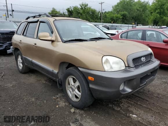 2002 Hyundai Santa Fe GLS с VIN KM8SC73DX2U318190, выставлен на аукционе Copart как лот 64256634 с пробегом 123 993 миль миль и На запчасти • Non repairable. История ставок и продаж доступна на DreamBid. Изображение 4.