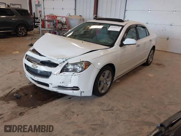 2012 Chevrolet Malibu 2LT z VIN 1G1ZD5E06CF141408, wystawiony jako IAAI lot #43165579 z przebiegiem 128 671 mil mil oraz . Historia ofert i sprzedaży dostępna na DreamBid. Obrazek 17.