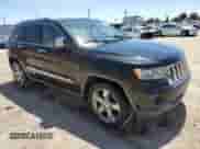 2011 Jeep Grand Cherokee Overland with VIN 1J4RS6GG7BC569267, listed as a Copart auction lot 64296195 with 182,996 mi miles and Clean title. Bid and sale history available at DreamBid. Image 4.