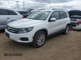 2017 Volkswagen Tiguan S с VIN WVGBV7AX2HK053101, выставлен на аукционе Copart как лот 70564155 с пробегом 56 925 миль миль и Списание • Salvage title. История ставок и продаж доступна на DreamBid. Изображение 1.