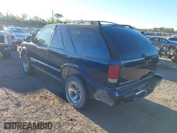 2002 Chevrolet Blazer LS с VIN 1GNCS18W12K127425, выставлен на аукционе IAAI как лот 41823290 с пробегом 182 949 миль миль и . История ставок и продаж доступна на DreamBid. Изображение 3.