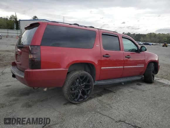 2014 Chevrolet Suburban LTZ with VIN 1GNSCKE05ER110007, listed as a Copart auction lot 50434205 with 203,918 mi miles and Salvage title. Bid and sale history available at DreamBid. Image 3.