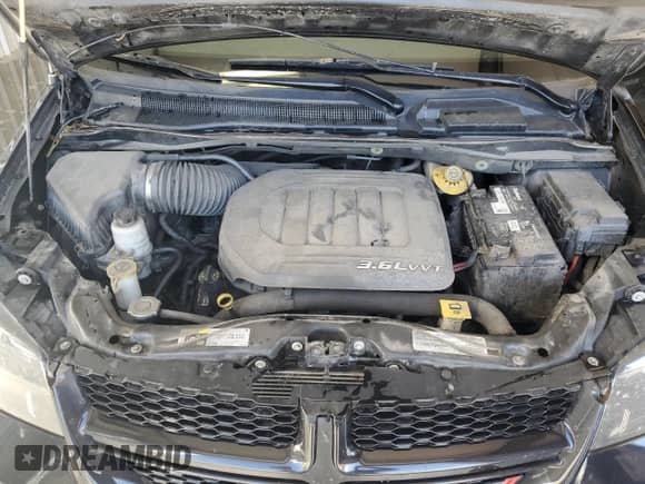 2016 Dodge Grand Caravan SE Plus with VIN 2C4RDGBG7GR359733, listed as a Copart auction lot 71696415 with 147,038 mi miles and Clean title. Bid and sale history available at DreamBid. Image 12.