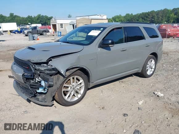 2023 Dodge Durango R/T Premium with VIN 1C4SDJCTXPC572677, listed as a IAAI auction lot 42663627 with 51,967 mi miles and . Bid and sale history available at DreamBid. Image 2.