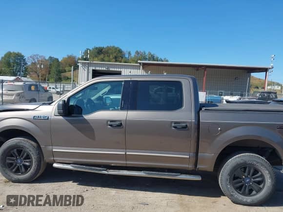 2020 Ford F-150 XLT with VIN 1FTEW1E49LFA24353, listed as a IAAI auction lot 43191576 with 58,463 mi miles and . Bid and sale history available at DreamBid. Image 14.