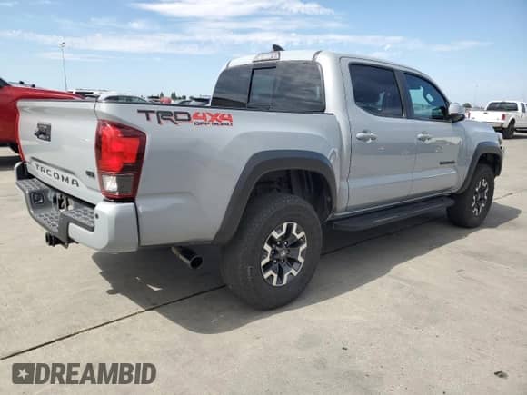 2019 Toyota Tacoma TRD Off Road z VIN 3TMCZ5AN7KM210332, wystawiony jako Copart lot #81743135 z przebiegiem 90 681 mil mil oraz Szkoda całkowita • Salvage title. Historia ofert i sprzedaży dostępna na DreamBid. Obrazek 3.