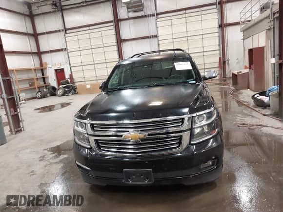 2016 Chevrolet Suburban LTZ with VIN 1GNSKJKCXGR108090, listed as a IAAI auction lot 42485236 with 120,395 mi miles and . Bid and sale history available at DreamBid. Image 12.