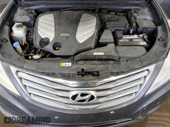 2013 Hyundai Azera z VIN KMHFH4JG2DA321197, wystawiony jako Copart lot #65585084 z przebiegiem 158 956 mil mil oraz Szkoda całkowita • Salvage title. Historia ofert i sprzedaży dostępna na DreamBid. Obrazek 11.