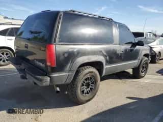 1997 Chevrolet Tahoe с VIN 3GNEK18R6VG156112, выставлен на аукционе Copart как лот 81587144 с пробегом 243 961 миль миль и На запчасти • Non repairable. История ставок и продаж доступна на DreamBid. Изображение 3.