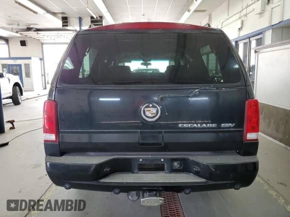 2004 Cadillac Escalade ESV z VIN 3GYFK66N04G233866, wystawiony jako Copart lot #64982075 z przebiegiem 204 562 mil mil oraz Czysty tytuł • Clean title. Historia ofert i sprzedaży dostępna na DreamBid. Obrazek 6.