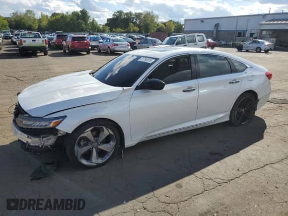 2018 Honda Accord Touring z VIN 1HGCV2F9XJA027462, wystawiony jako Copart lot #81780915 z przebiegiem Nie podano mil oraz Szkoda całkowita • Salvage title. Historia ofert i sprzedaży dostępna na DreamBid. Obrazek 1.