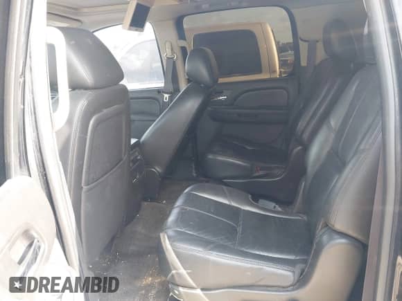 2011 Chevrolet Suburban LT with VIN 1GNSCJE07BR259203, listed as a IAAI auction lot 42888910 with 246,717 mi miles and . Bid and sale history available at DreamBid. Image 8.