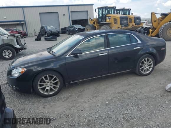 2009 Chevrolet Malibu LTZ with VIN 1G1ZK577X94229060, listed as a Copart auction lot 68033845 with 148,376 mi miles and Salvage title. Bid and sale history available at DreamBid. Image 1.