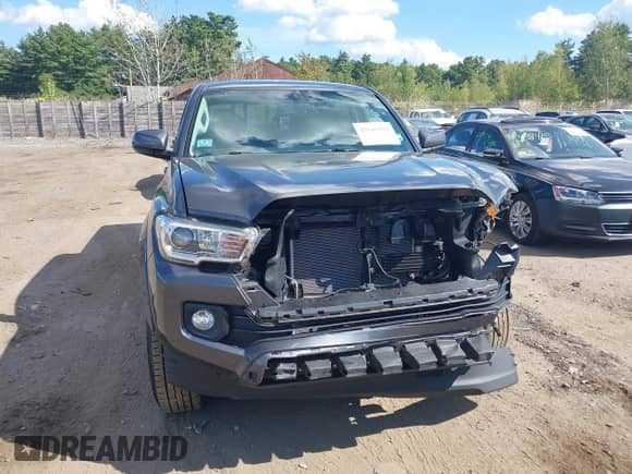 2017 Toyota Tacoma SR5 with VIN 3TMCZ5AN0HM102398, listed as a IAAI auction lot 43141321 with 136,440 mi miles and . Bid and sale history available at DreamBid. Image 13.