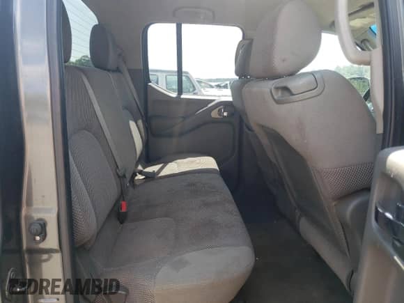 2009 Nissan Frontier SE z VIN 1N6AD07U79C411051, wystawiony jako Copart lot #81083185 z przebiegiem 278 604 mil mil oraz Szkoda całkowita • Salvage title. Historia ofert i sprzedaży dostępna na DreamBid. Obrazek 10.