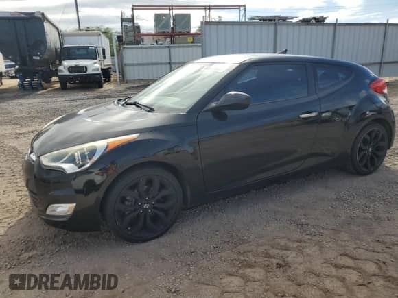 2015 Hyundai Veloster z VIN KMHTC6AD2FU220312, wystawiony jako Copart lot #65853685 z przebiegiem 46 683 mil mil oraz Szkoda całkowita • Salvage title. Historia ofert i sprzedaży dostępna na DreamBid. Obrazek 1.