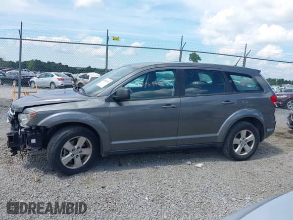2013 Dodge Journey American Value z VIN 3C4PDCAB2DT560776, wystawiony jako IAAI lot #42988970 z przebiegiem 126 698 mil mil oraz . Historia ofert i sprzedaży dostępna na DreamBid. Obrazek 15.