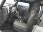 2004 Jeep Wrangler X z VIN 1J4FA39S04P739230, wystawiony jako Copart lot #84052405 z przebiegiem 97 855 mil mil oraz Szkoda całkowita • Salvage title. Historia ofert i sprzedaży dostępna na DreamBid. Obrazek 7.