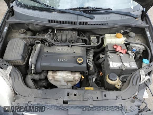 2008 Chevrolet Aveo LS z VIN KL1TD56648B129148, wystawiony jako Copart lot #51136714 z przebiegiem 182 545 mil mil oraz Szkoda całkowita • Salvage title. Historia ofert i sprzedaży dostępna na DreamBid. Obrazek 13.