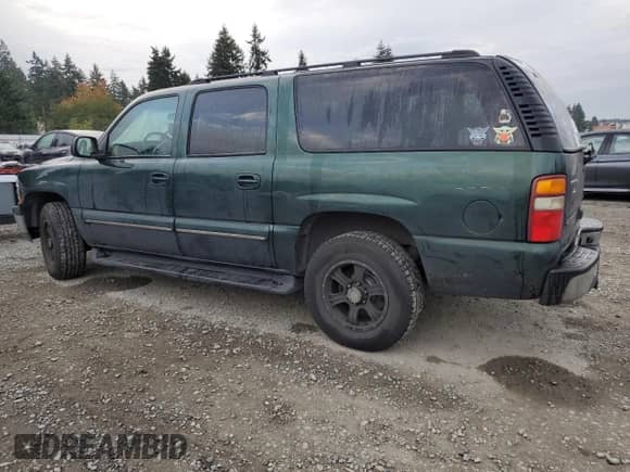 2003 Chevrolet Suburban Z71 with VIN 3GNFK16Z83G133869, listed as a Copart auction lot 85948315 with 236,789 mi miles and Salvage title. Bid and sale history available at DreamBid. Image 2.
