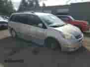 2005 Toyota Sienna XLE z VIN 5TDBA22CX5S051132, wystawiony jako Copart lot #84712135 z przebiegiem 179 807 mil mil oraz Szkoda całkowita • Salvage title. Historia ofert i sprzedaży dostępna na DreamBid. Obrazek 4.