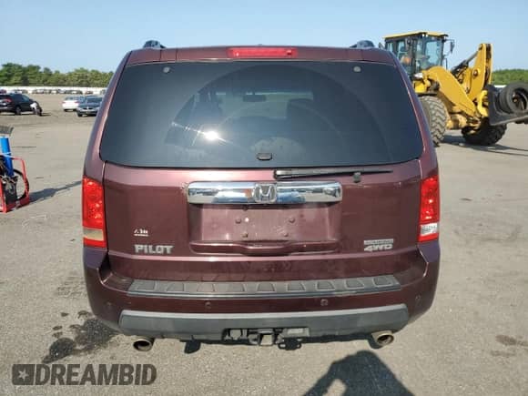 2010 Honda Pilot Touring with VIN 5FNYF4H8XAB026496, listed as a Copart auction lot 66742805 with 291,524 mi miles and Salvage title. Bid and sale history available at DreamBid. Image 6.