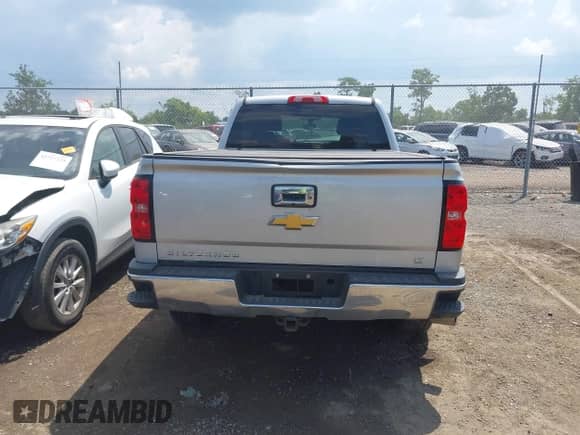 2015 Chevrolet Silverado 1500 LT z VIN 1GCVKREHXFZ431825, wystawiony jako IAAI lot #42714255 z przebiegiem 172 750 mil mil oraz . Historia ofert i sprzedaży dostępna na DreamBid. Obrazek 17.