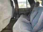 2000 Chevrolet Blazer LT with VIN 1GNCS13W6Y2181741, listed as a Copart auction lot 77990304 with 188,281 mi miles and Salvage title. Bid and sale history available at DreamBid. Image 10.