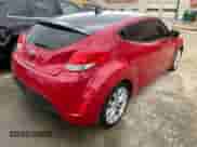 2015 Hyundai Veloster z VIN KMHTC6AD0FU238274, wystawiony jako Copart lot #45174464 z przebiegiem 143 112 mil mil oraz . Historia ofert i sprzedaży dostępna na DreamBid. Obrazek 4.