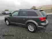 2015 Dodge Journey SXT with VIN 3C4PDCBG0FT718061, listed as a Copart auction lot 82205215 with 174,494 mi miles and Clean title. Bid and sale history available at DreamBid. Image 2.