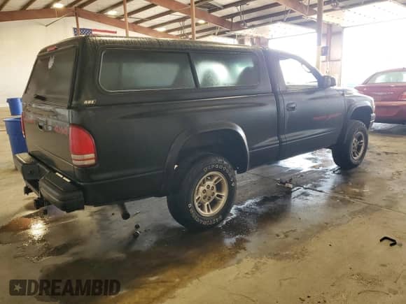 1999 Dodge Dakota с VIN 1B7GG26X5XS216564, выставлен на аукционе Copart как лот 85286805 с пробегом 183 423 миль миль и Списание • Salvage title. История ставок и продаж доступна на DreamBid. Изображение 3.