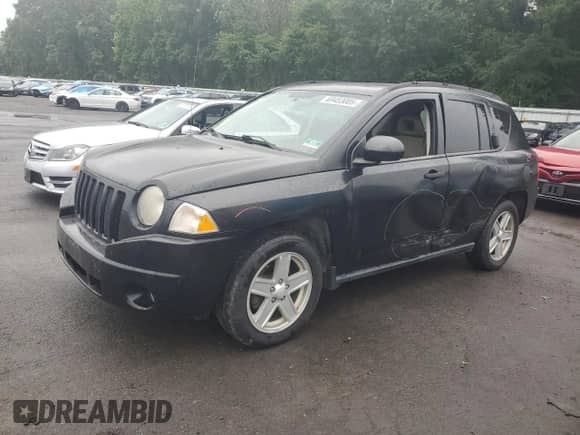 2007 Jeep Compass Sport with VIN 1J8FT47W27D130263, listed as a Copart auction lot 69453005 with 186,589 mi miles and Salvage title. Bid and sale history available at DreamBid. Image 1.