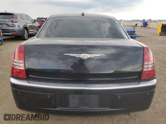 2005 Chrysler 300 C with VIN 2C3AA63H15H694064, listed as a Copart auction lot 70875005 with 110,578 mi miles and Salvage title. Bid and sale history available at DreamBid. Image 6.