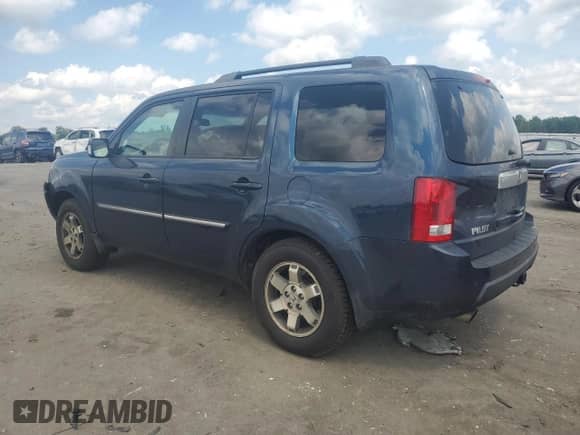 2010 Honda Pilot Touring with VIN 5FNYF4H85AB003241, listed as a Copart auction lot 64334555 with 234,506 mi miles and Salvage title. Bid and sale history available at DreamBid. Image 2.