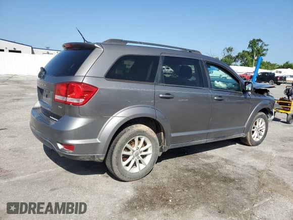 2013 Dodge Journey SXT с VIN 3C4PDDBG2DT586830, выставлен на аукционе Copart как лот 61651045 с пробегом Не указан миль и Списание • Salvage title. История ставок и продаж доступна на DreamBid. Изображение 3.