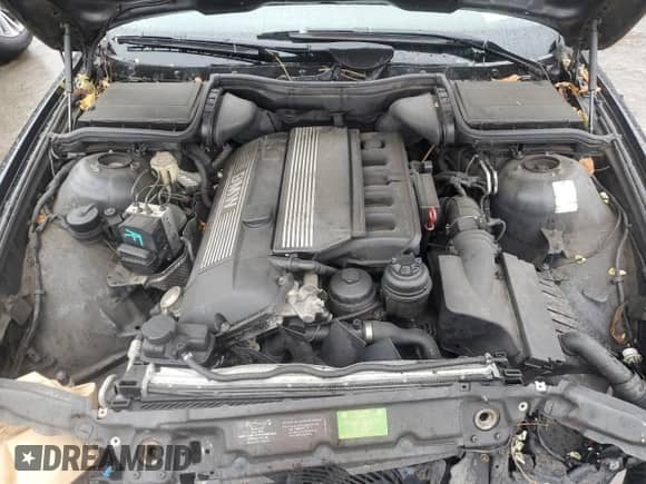 1999 BMW 5 Series 528i с VIN WBADM6337XBY33191, выставлен на аукционе Copart как лот 82470594 с пробегом 145 691 миль миль и На запчасти • Non repairable. История ставок и продаж доступна на DreamBid. Изображение 11.