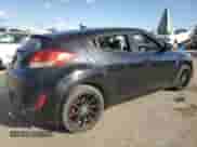 2013 Hyundai Veloster w/Black Int z VIN KMHTC6AD8DU147119, wystawiony jako Copart lot #82261415 z przebiegiem 132 516 mil mil oraz Szkoda całkowita • Salvage title. Historia ofert i sprzedaży dostępna na DreamBid. Obrazek 3.