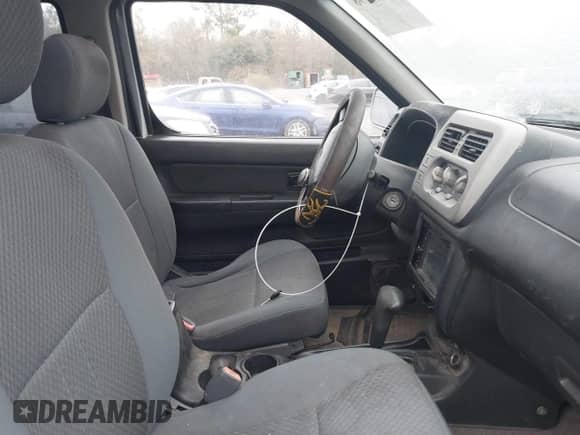 2001 Nissan Frontier SE with VIN 1N6ED27T91C318489, listed as a IAAI auction lot 41441798 with 214,834 mi miles and . Bid and sale history available at DreamBid. Image 5.