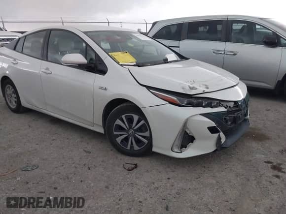 2018 Toyota Prius Plus z VIN JTDKARFP0J3084142, wystawiony jako IAAI lot #41936736 z przebiegiem 50 699 mil mil oraz . Historia ofert i sprzedaży dostępna na DreamBid. Obrazek 1.